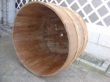A koshiki or sake steaming vat laying on its side