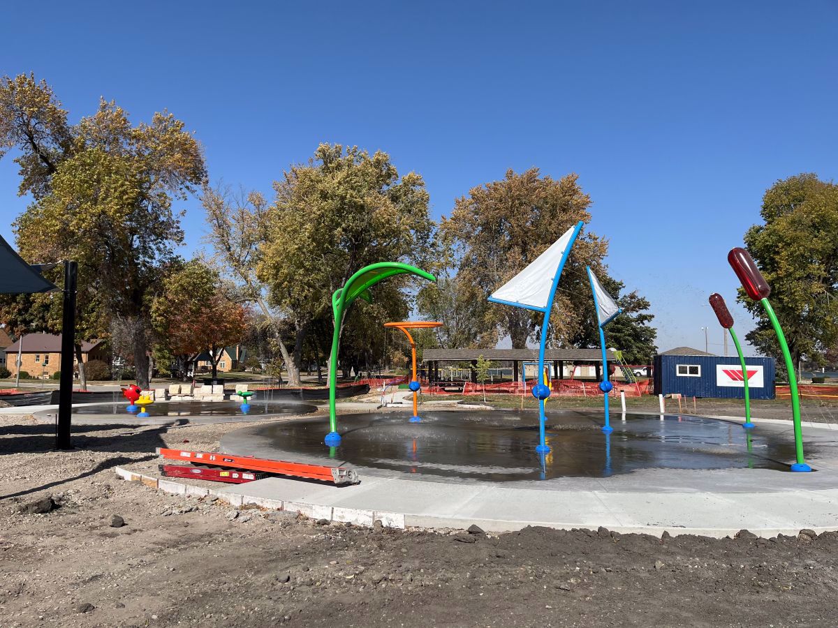 Photo of all ages splash area of splash pad