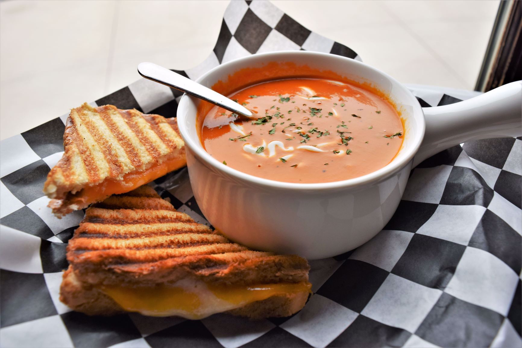 Photo of tomato soup and grilled cheese sandwich at Dockside Lounge