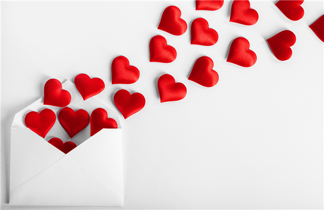 A photo of a  red community puzzle shelf.