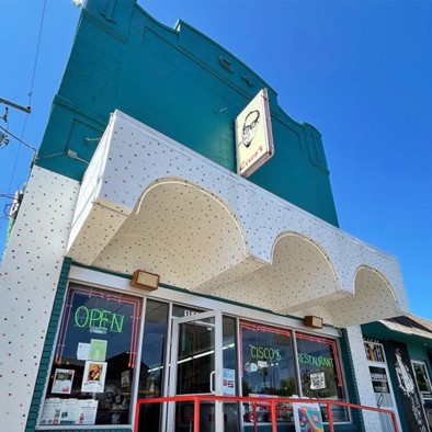 On an orange background, the logo reads 'Austin Vida September Cultura Guide' [the 'i' in Vida is a butterfly]