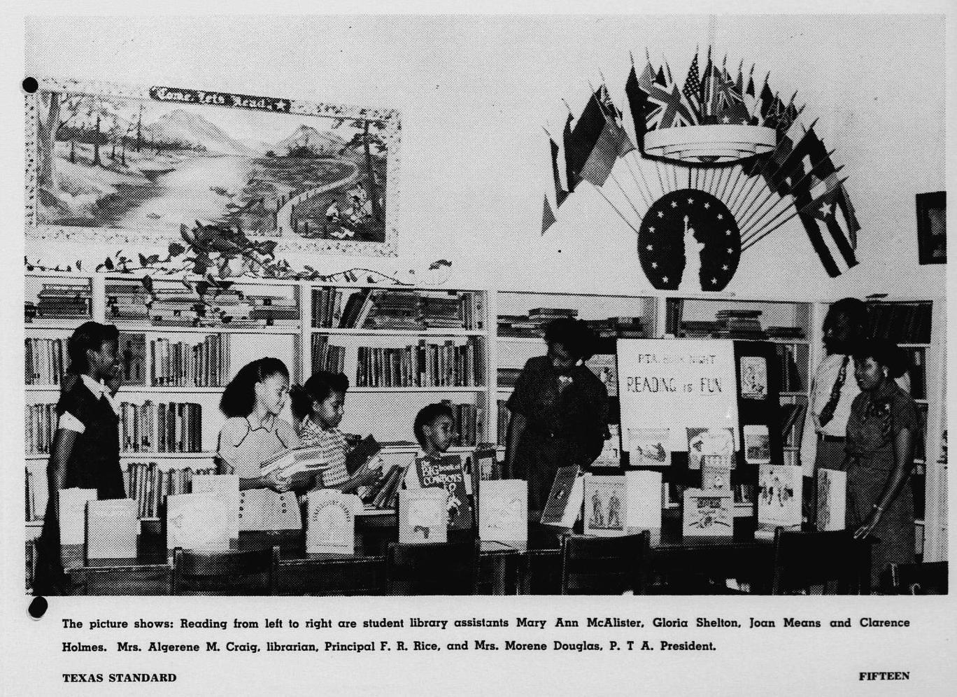 Black and white photo from 1954 shows black students in the library of Blackshear Elementary School. The picture shows: Reading from left to right are student library assistants Mary Ann McAlister, Gloria Shelton, Joan Means and Clarence Holmes. Mrs. Algerene M. Craig, librarian, Principal F.R. Rice, and Mrs. Morene Douglas, P.T.A. President. 