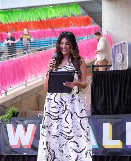 Photograph of a mural titled “The Sisterhood of Two Hearts” displayed on the exterior wall of Mexic-Arte Museum. The artwork features vibrant, colorful depictions of cultural unity between Austin, Texas, and Saltillo, Mexico. Artists: Ana Sofia and Chous. Photo by Lori Renteria. Text overlay says “The Creative Reset” with a City of Austin seal.