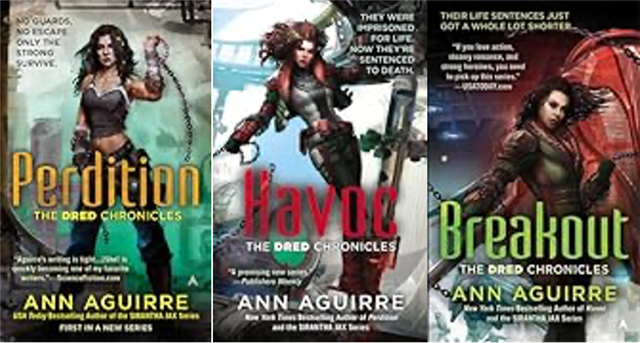 The three covers of the Perdition trilogy by Ann Aguirre: Perdition, Havoc, and Breakout. On each cover a dark-haired woman wearing chains stands in an action pose.