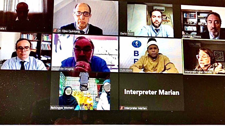 A computer screen shot showing several faces on different computer screens, including two interpreters and a screen that says 'Rohingya women'