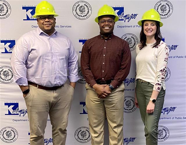 Terrell Cole, Deputy County Administrator for Internal Services, Kevin Catlin, County Administrator/Controller, and Lyndi Warner, Deputy County Administrator for External Services in yellow hardhats