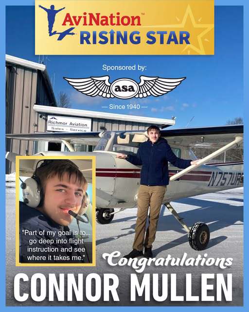 Young Man standing in front of plane with graphic