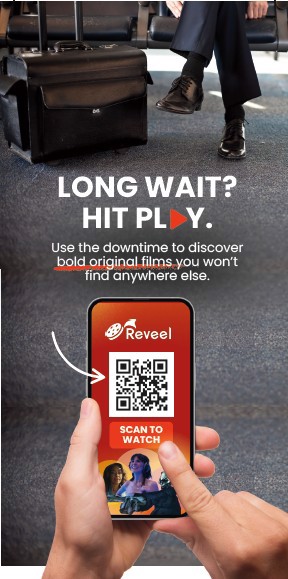 2 hands holding phone with Reveel advertisement