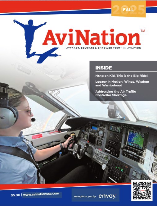 Young female pilot sitting in cockput of plane 