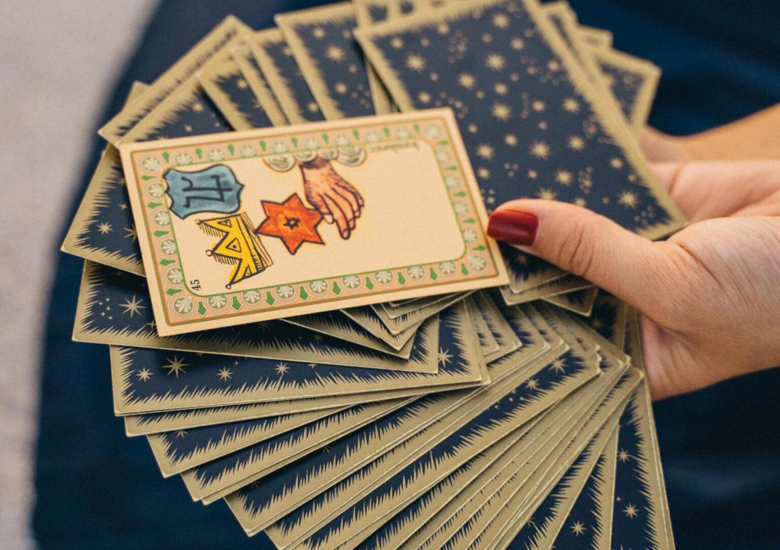 Image of a deck of tarot cards spread out.