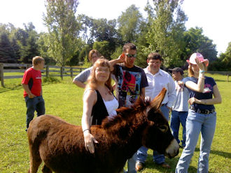 young adults with mini-donkey