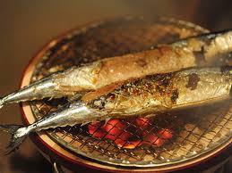 Sanma (saury) being grilled