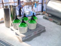 Sake sitting in 18-liter bottles called toh-bin