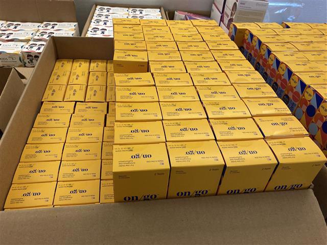 Yellow rapid test kit boxes