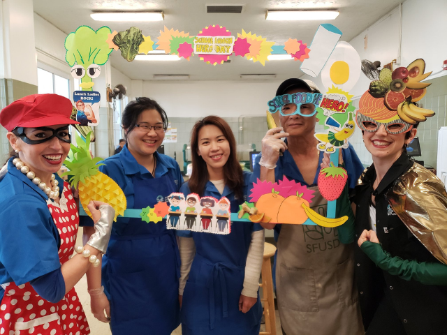 Student Nutrition Services staff dressed as school lunch heroes