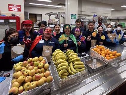 Lowell cafeteria staff dressed up for School Lunch Hero Day
