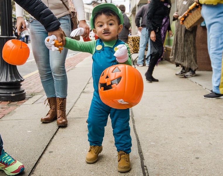 A kid at the Main Street trick-or-treating event.