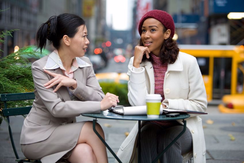 2 women talking casually