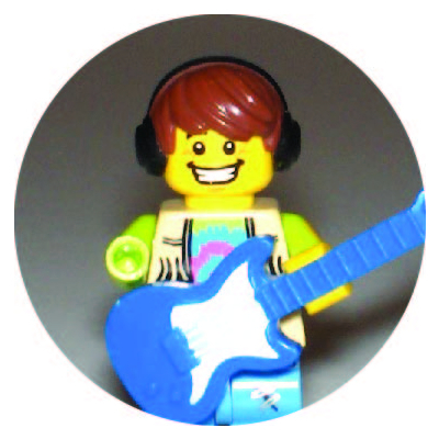 Nate Munro profile image: a Lego person with guitar, headphones, and amputated right arm