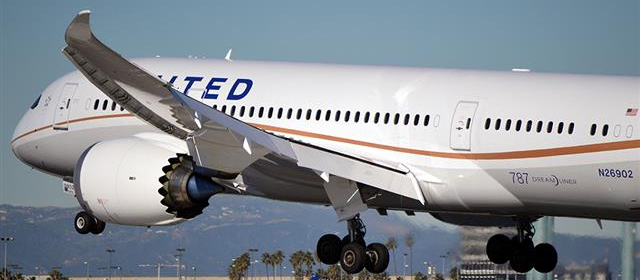 A close up shot of a United 787 Dream Liner landing at LAX. 