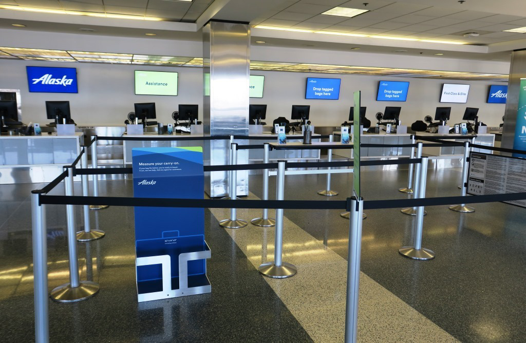 People sitting and waiting at Gate 12A