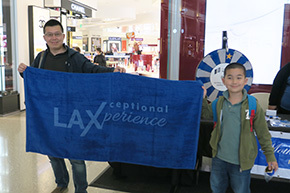 LAX Traveler with Guest Experience Banner